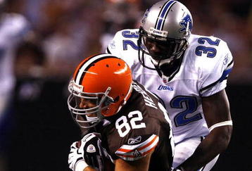 CLEVELAND - AUGUST 22:  Steve Heiden #82 of the Cleveland Browns falls forward as he is hit by Anthony Henry #32 of the Detroit Lions during the first quarter of their NFL game in Cleveland Browns Stadium on August 22, 2009 in Cleveland, Ohio.  (Photo by Matt Sullivan/Getty Images)