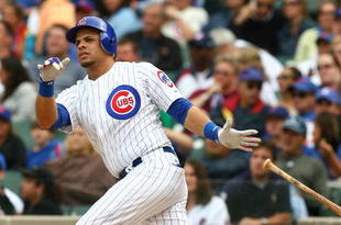 CHICAGO - AUGUST 28: Aramis Ramirez #16 of the Chicago Cubs hits the ball against the New York Mets on August 28, 2009 at Wrigley Field in Chicago, Illinois. The Cubs defeated the Mets 5-2. (Photo by Jonathan Daniel/Getty Images)