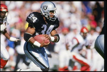 13 Jan 1991: Running back Bo Jackson of the Los Angeles Raiders runs down the field during a playoff game against the Cincinnati Bengals at the Los Angeles Coliseum in Los Angeles, California. The Raiders won the game 20-10.