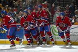 HAMILTON, ONTARIO - DECEMBER 3:  Duncan Milroy #23, Tomas Plekanec #14, Ron Hainsey #65, Dan Focht #44 and Andrei Kostitsyn #17 of the Chicago Wolves skate away from a celebration during a American Hockey League game against the Hamilton Bulldogs at Copps Coliseum on December 3, 2004 in Hamilton, Ontario.  The Wolves defeated the Bulldogs 2-1 in overtime.  (Photo by Claus Andersen/Getty Images)