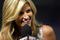 ARLINGTON, TX - AUGUST 06:  ESPN reporter Erin Andrews during a game between the New York Yankees and the Texas Rangers on August 6, 2008 at Rangers Ballpark in Arlington, Texas.  (Photo by Ronald Martinez/Getty Images)