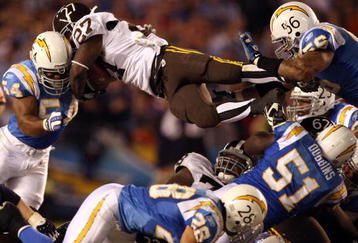SAN DIEGO, CA - OCTOBER 19: Runningback Knowshon Moreno #27 of the Denver Broncos goes up for the first down against the San Diego Chargers during Monday Night Football on October 19, 2009 at Qualcomm Stadium in San Diego, California. (Photo by Donald Miralle/Getty Images)