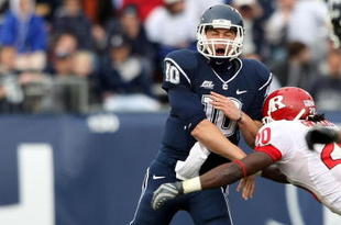 EAST HARTFORD, CT - OCTOBER 31: Zach Frazer #10 of the Connecticut Huskies passes the ball under pressure from Khaseem Greene #20 of the Rutgers Scarlet Knights on October 31, 2009 at Rentschler Field in East Hartford, Connecticut. Rutgers defeated Connecticut 28-24. (Photo by Elsa/Getty Images)