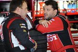 LONG POND, PA - JUNE 06:  Ryan Newman (L), driver of the #39 Haas Automation/US Army Chevrolet, talks with teammate Tony Stewart (R), driver of the #14 Old Spice/Office Depot Chevrolet, in the garage during practice for the NASCAR Sprint Cup Series Pocono 500 on June 6, 2009 at Pocono International Raceway in Long Pond, Pennsylvania.  (Photo by John Harrelson/Getty Images for NASCAR)