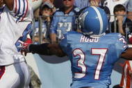NASHVILLE, TN - NOVEMBER 15: Lee Evans #83 of the Buffalo Bills makes the touchdown catch under pressure from Rod Hood  #37 of the Tennessee Titans in their NFL game at LP Field on November 15, 2009 in Nashville, Tennessee.    (Photo by John Sommers II/Getty Images)