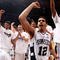 NEW YORK - APRIL 02: Talor Battle #12 of the Penn State Nittany Lions celebrates with team mates after defeating the Baylor Bears during the NIT Championship match at Madison Square Garden on April 2, 2009 in New York, New York.  (Photo by Chris McGrath/Getty Images)