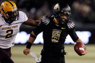 EUGENE,OR - NOVEMBER 14: Quarterback Jeremiah Masoli #8 of the Oregon Ducks outruns safety Ryan McFoy #2 in the third quarter of the game at Autzen Stadium on November 14, 2009 in Eugene, Oregon. Oregon Defeated arizona State 44-21. (Photo by Steve Dykes/Getty Images)