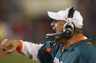 CHARLOTTE - NOVEMBER 19: Head coach Tony Sparano of the Miami Dolphins reacts after Ricky Williams scored a 46-yard rushing touchdown against the Carolina Panthers at Bank of America Stadium on November 19, 2009 in Charlotte, North Carolina.  (Photo by Streeter Lecka/Getty Images)