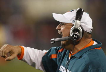 CHARLOTTE - NOVEMBER 19: Head coach Tony Sparano of the Miami Dolphins reacts after Ricky Williams scored a 46-yard rushing touchdown against the Carolina Panthers at Bank of America Stadium on November 19, 2009 in Charlotte, North Carolina.  (Photo by Streeter Lecka/Getty Images)