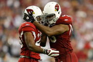 GLENDALE, AZ - NOVEMBER 15:  Beanie Wells (L) #26 of the Arizona Cardinals celebrates a touchdown with Bertrand Berry #93 in the second half against the Seattle Seahawks at University of Phoenix Stadium on November 15, 2009 in Glendale, Arizona. The Cardinals defeated the Seahawks 31-20.  (Photo by Jeff Gross/Getty Images)