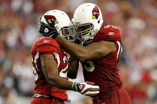 GLENDALE, AZ - NOVEMBER 15:  Beanie Wells (L) #26 of the Arizona Cardinals celebrates a touchdown with Bertrand Berry #93 in the second half against the Seattle Seahawks at University of Phoenix Stadium on November 15, 2009 in Glendale, Arizona. The Cardinals defeated the Seahawks 31-20.  (Photo by Jeff Gross/Getty Images)