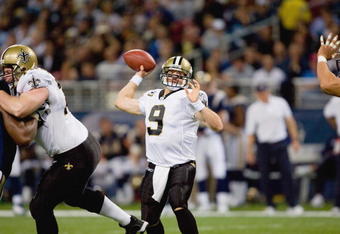 ST. LOUIS - NOVEMBER 15:  Quarterback Drew Brees #9 of the New Orleans Saints passes the ball during the game against the St. Louis Rams at the Edward Jones Dome on November 15, 2009 in St. Louis, Missouri.  (Photo by Dilip Vishwanat/Getty Images)