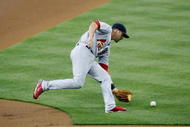 LOS ANGELES, CA - AUGUST 19:  Mark DeRosa #7 of the St. Louis Cardinals fields a ground ball against the Los Angeles Dodgers at Dodger Stadium on August 19, 2009 in Los Angeles, California.  (Photo by Jeff Gross/Getty Images)