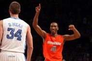 NEW YORK - NOVEMBER 20: Wes Johnson #4 of the Syracuse Orange celebrates after defeating the North Carolina Tar Heels in the championship game of the 2K Sports Classic on November 20, 2009 at Madison Square Garden in New York City. The Orange defeated the Tar Heels 87-71 to win the championship. (Photo by Jim McIsaac/Getty Images)