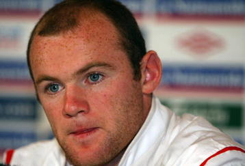 HERTFORD, ENGLAND - OCTOBER 07:  England's Wayne Rooney talks to the media during an England press conference prior to Saturday's World Cup qualifier against Ukraine at The Grove Hotel on October 7, 2009 in Hertford, England.  (Photo by Jamie McDonald/Getty Images)