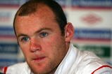 HERTFORD, ENGLAND - OCTOBER 07:  England's Wayne Rooney talks to the media during an England press conference prior to Saturday's World Cup qualifier against Ukraine at The Grove Hotel on October 7, 2009 in Hertford, England.  (Photo by Jamie McDonald/Getty Images)