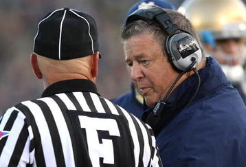 SOUTH BEND, IN - OCTOBER 17: Head coach Charlie Weis of the Notre Dame Fighting Irish talks with a referee during a game against the USC Trojans at Notre Dame Stadium on October 17, 2009 in South Bend, Indiana. USC defeated Notre Dame 34-27. (Photo by Jonathan Daniel/Getty Images)