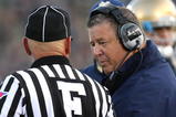 SOUTH BEND, IN - OCTOBER 17: Head coach Charlie Weis of the Notre Dame Fighting Irish talks with a referee during a game against the USC Trojans at Notre Dame Stadium on October 17, 2009 in South Bend, Indiana. USC defeated Notre Dame 34-27. (Photo by Jonathan Daniel/Getty Images)