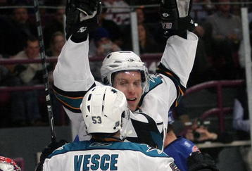 NEW YORK - OCTOBER 19: Dany Heatley #15 of the San Jose Sharks scores a first period goal against Steve Valiquette #40 of the New York Rangers and is joined by Ryan Vesce #53 at Madison Square Garden on October 19, 2009 in New York City.  (Photo by Bruce Bennett/Getty Images)