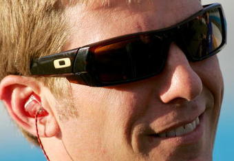 AVONDALE, AZ - NOVEMBER 13:  Jamie McMurray, driver of the #26 IRWIN Ford, stands on pit road during qualifying for the NASCAR Sprint Cup Series Checker O'Reilly Auto Parts 500 at Phoenix International Raceway on November 13, 2009 in Avondale, AZ.  (Photo by Todd Warshaw/Getty Images for NASCAR)