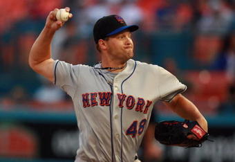 MIAMI - MARCH 31:  Relief pitcher Aaron Heilman #48 of the New York Mets pitches against the Florida Marlins on Opening Day at Dolphin Stadium on March 31, 2008 in Miami, Florida. The Mets defeated the Marlins 7-2.  (Photo by Doug Benc/Getty Images)