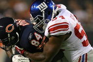 CHICAGO - AUGUST 22: Brandon  Rideau #84 of the Chicago Bears is tackled by Jonathan Goff #54 of the New York Giants during a pre-season game on August 22, 2009 at Soldier Field in Chicago, Illinois. The Bears defeated the Giants 17-3. (Photo by Jonathan Daniel/Getty Images)