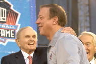 CANTON, OH - AUGUST 04:  Buffalo Bills owner Ralph Wilson (L) and retired quarterback Jim Kelly hug during the Class of 2007 Pro Football Hall of Fame Enshrinement Ceremony August 4, 2007 in Canton, Ohio. (Photo by Al Messerschmidt/Getty Images)