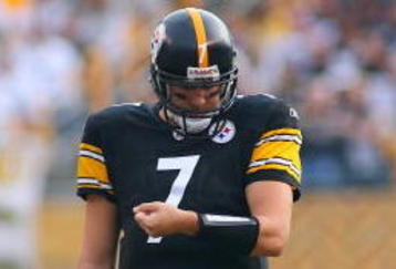 PITTSBURGH - NOVEMBER 15:  Quarterback Ben Roethlisberger #7 of the Pittsburgh Steelers looks at his wrist band for a play prior to the snap of the ball behind center during their game against the Cincinnati Bengals at Heinz Field on November 15, 2009 in Pittsburgh, Pennsylvania. The Bengals defeated the Steelers 18-12. (Photo by Rick Stewart/Getty Images)