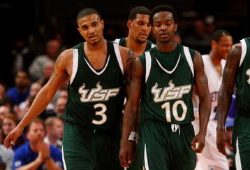 NEW YORK - MARCH 10:  Chris Howard #3 and Justin Leemow #10 of the USF Bulls  look on against the Seton Hall Pirates during the first round of the Big East Tournament at Madison Square Garden on March 10, 2009 in New York City.  (Photo by Jim McIsaac/Getty Images)