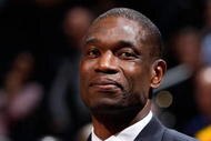 ATLANTA - NOVEMBER 20:  Former player Dikembe Mutombo watches the game between the Atlanta Hawks and the Houston Rockets at Philips Arena on November 20, 2009 in Atlanta, Georgia.  NOTE TO USER: User expressly acknowledges and agrees that, by downloading and/or using this Photograph, User is consenting to the terms and conditions of the Getty Images License Agreement.  (Photo by Kevin C. Cox/Getty Images)