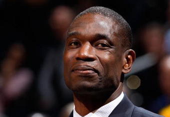 ATLANTA - NOVEMBER 20:  Former player Dikembe Mutombo watches the game between the Atlanta Hawks and the Houston Rockets at Philips Arena on November 20, 2009 in Atlanta, Georgia.  NOTE TO USER: User expressly acknowledges and agrees that, by downloading and/or using this Photograph, User is consenting to the terms and conditions of the Getty Images License Agreement.  (Photo by Kevin C. Cox/Getty Images)