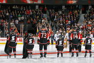 OTTAWA, ON - NOVEMBER 10:  During the Ottawa Senators 'Minor Hockey Week' minor hockey players lineup on the blueline along with NHL players such as Jarkko Ruutu #73 and Chris Campoli #14 during the National Anthem before a game against the Edmonton Oilers at Scotiabank Place on November 10, 2009 in Ottawa, Canada.  (Photo by Phillip MacCallum/Getty Images)