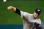 ST LOUIS, MO - JULY 14:  American League All-Star Roy Halladay of the Toronto Blue Jays pitches during the 2009 MLB All-Star Game at Busch Stadium on July 14, 2009 in St Louis, Missouri.  (Photo by Morry Gash-Pool/Getty Images)