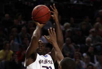 PORTLAND, OR - MARCH 19:  Quincy Pondexter #20 of the Washington Huskies shoots the ball over Ravern Johnson #2 of the Mississippi State Bulldogs during the first round of the NCAA Division I Men's Basketball Tournament at the Rose Garden on March 19, 2009 in Portland, Oregon.  (Photo by Jonathan Ferrey/Getty Images)