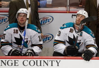 ANAHEIM, CA - SEPTEMBER 21:  Dany Heatley #15 and Joe Thornton #19 of the San Jose Sharks sit beside one another on the bench during the preseason game against the Anaheim Ducks at the Honda Center on September 21, 2009 in Anaheim, California. The Ducks defeated the Sharks 3-2.  (Photo by Jeff Gross/Getty Images)