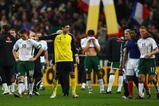 PARIS - FRANCE-NOVEMBER 18: Robbie Keane (L) of Ireland is consoled by Hugo lloris (2nd L) as Patrice Evra (2nd R) consoles Damien Duff (R) after the 1-1 draw which saw Ireland lose 2-1 on aggregate during the France v Republic of Ireland FIFA 2010 World Cup Qualifying Play Off second leg match at the Stade de France on November 18, 2009 in Paris, France.  (Photo by Michael Steele/Getty Images)
