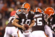 CLEVELAND - NOVEMBER 16: Quarterback Brady Quinn #10 of the Cleveland Browns turns to hand the ball off against the Baltimore Ravens at Cleveland Browns Stadium on November 16, 2009 in Cleveland, Ohio.  (Photo by Matt Sullivan/Getty Images)