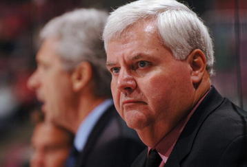 EAST RUTHERFORD, NJ - OCTOBER 14:  Head coach Ken Hitchcock of the Philadelphia Flyers looks on against the New Jersey Devils at Continental Airlines Arena on October 14, 2006 in East Rutherford, New Jersey. The Devils won 3-2.  (Photo by Norman Y. Lono/Getty Images)