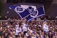 7 May 2001: Toronto Maple Leafs fans waves flags during game 6 of the Eastern Conference Semifinals against the New Jersey Devils at the Air Canada Center in Toronto, Ontario, Canada.  The Devils won 4-2. DIGITAL IMAGE.  Mandatory Credit: Harry How/ALLSPORT