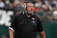 OAKLAND, CA - OCTOBER 18:  Head coach Tom Cable of the Oakland Raiders looks on against the Philadelphia Eagles during an NFL game at the Oakland-Alameda County Coliseum on October 18, 2009 in Oakland, California.  (Photo by Jed Jacobsohn/Getty Images)