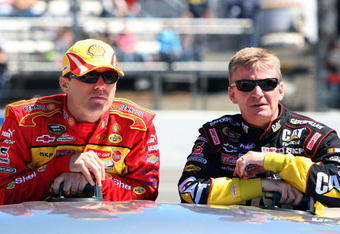 MARTINSVILLE, VA - MARCH 29: Kevin Harvick, driver of the #29 Shell/Pennzoil Chevrolet, rides in a truck with Jeff Burton, driver of the #31 Caterpillar Chevrolet, during driver introductions prior to the start of the NASCAR Sprint Cup Series Goody's Fast Pain Relief 500 at the Martinsville Speedway on March 29, 2009 in Martinsville, Virginia.  (Photo by Jim McIsaac/Getty Images)