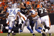 CLEVELAND - AUGUST 22:  Runningback Jamal Lewis #31 of the Cleveland Browns scores past Kalvin Pearson #24 of the Detroit Lions during the first quarter of their NFL game in Cleveland Browns Stadium on August 22, 2009 in Cleveland, Ohio.  (Photo by Matt Sullivan/Getty Images)