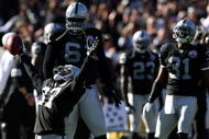 OAKLAND, CA - NOVEMBER 15:  Chris Johnson #37 of the Oakland Raiders celebrates after an interception against the Kansas City Chiefs during an NFL game at Oakland-Alameda County Coliseum on November 15, 2009 in Oakland, California. (Photo by Jed Jacobsohn/Getty Images)