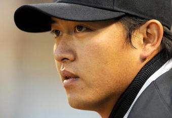 BALTIMORE - APRIL 06:  Chien-Ming Wang #40 of the New York Yankees watches the game against the Baltimore Orioles on April 6, 2009 at Camden Yards in Baltimore, Maryland.  (Photo by Greg Fiume/Getty Images)