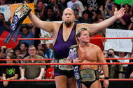LAS VEGAS - AUGUST 24:  Wrestlers and tag team partners Chris Jericho (L) and Big Show appear in the ring during the WWE Monday Night Raw show at the Thomas & Mack Center August 24, 2009 in Las Vegas, Nevada.  (Photo by Ethan Miller/Getty Images)