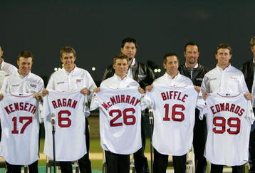 DAYTONA, FL - FEBRUARY 14:  Matt Kenseth, David Ragan, Jamie McMurray, Josh Beckett, Greg Biffle, Tim Wakefield, Carl Edwards and Mike Timlin poses for photos at a press conference announcing the partnership between Roush Racing and Fenway Sports Group at Jackie Robinson Ball Park on February 14, 2007 in Daytona, Florida.  (Photo by Matthew Stockman/Getty Images)