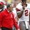 ANN ARBOR, MI - NOVEMBER 21: Head coach Jim Tressel of the Ohio State Buckeyes walks the sideline next to Terrelle Pryor #2 while playing the Michigan Wolverines on November 21, 2009 at Michigan Stadium in Ann Arbor, Michigan. Ohio State won the game 21-10. (Photo by Gregory Shamus/Getty Images)