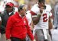ANN ARBOR, MI - NOVEMBER 21: Head coach Jim Tressel of the Ohio State Buckeyes walks the sideline next to Terrelle Pryor #2 while playing the Michigan Wolverines on November 21, 2009 at Michigan Stadium in Ann Arbor, Michigan. Ohio State won the game 21-10. (Photo by Gregory Shamus/Getty Images)