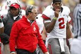 ANN ARBOR, MI - NOVEMBER 21: Head coach Jim Tressel of the Ohio State Buckeyes walks the sideline next to Terrelle Pryor #2 while playing the Michigan Wolverines on November 21, 2009 at Michigan Stadium in Ann Arbor, Michigan. Ohio State won the game 21-10. (Photo by Gregory Shamus/Getty Images)