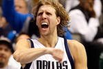 DALLAS - NOVEMBER 18:  Forward Dirk Nowitzki #41 of the Dallas Mavericks reacts after scoring in overtime against the San Antonio Spurs on November 18, 2009 at American Airlines Center in Dallas, Texas.  NOTE TO USER: User expressly acknowledges and agrees that, by downloading and/or using this Photograph, user is consenting to the terms and conditions of the Getty Images License Agreement.  (Photo by Ronald Martinez/Getty Images)